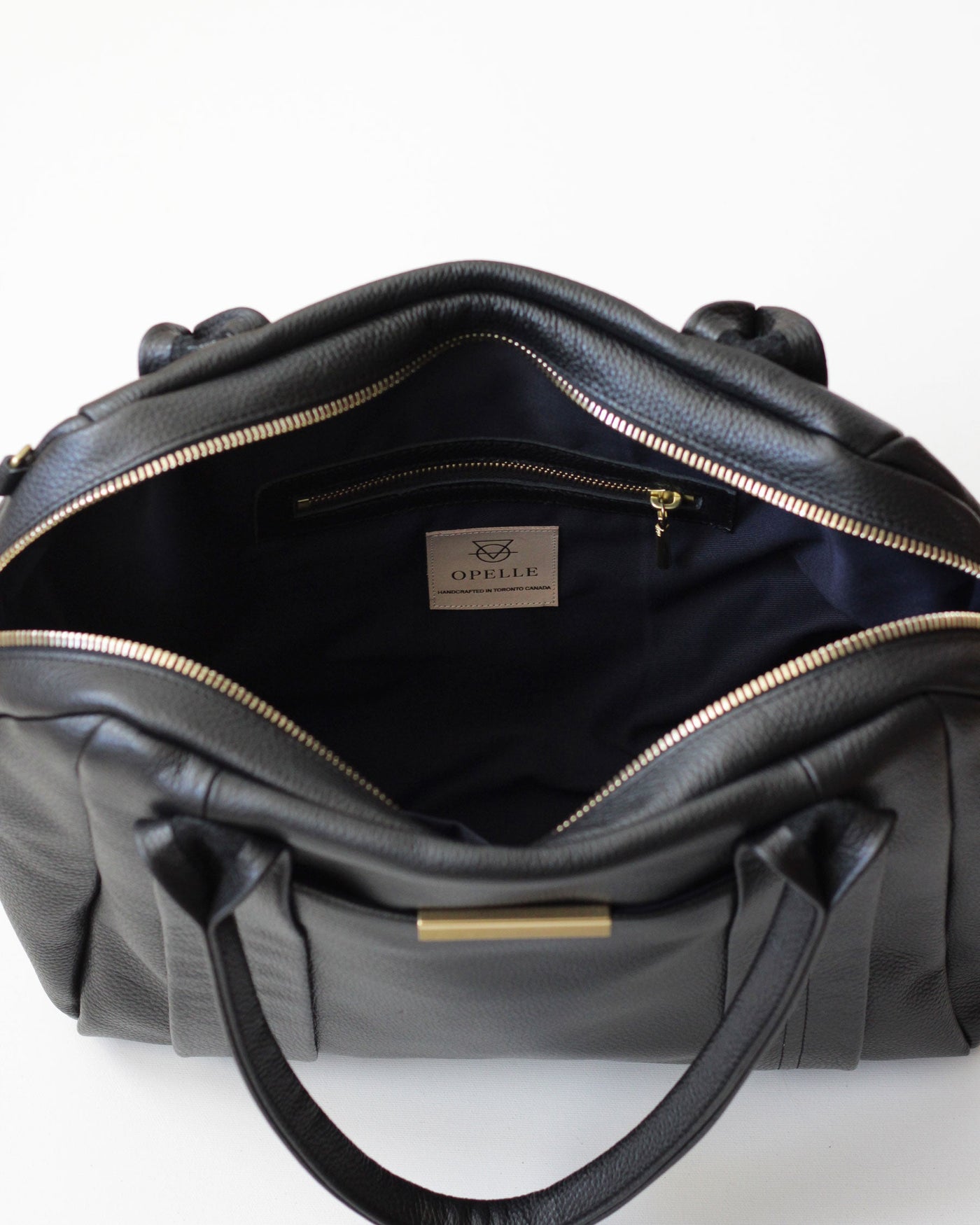 Liria Duffle - Opelle bag Permanent Collection - Opelle leather handbag handcrafted leather bag toronto Canada